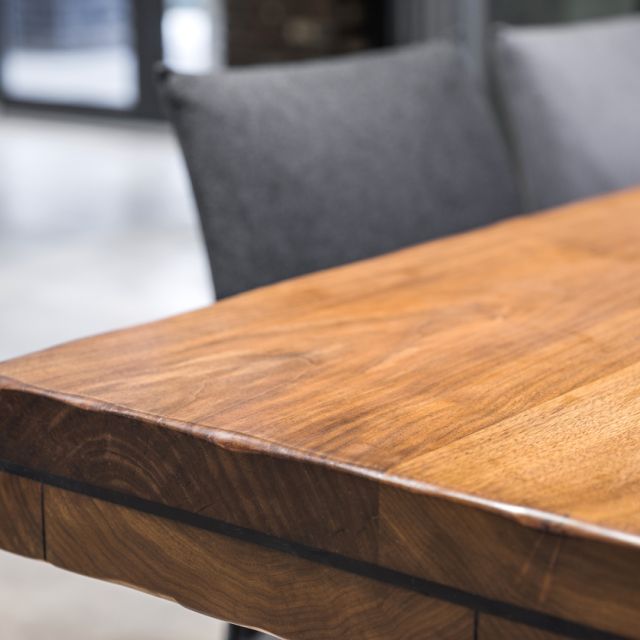 Close-up of a luxurious table corner at legacy furniture showroom